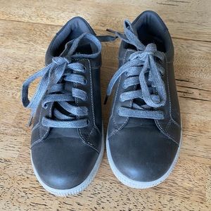 Boy’s grey dress shoe/sneaker combo